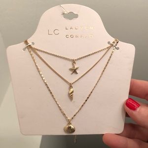 Lauren Conrad gold seashell necklace trio
